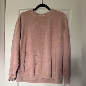 Dusty pink Vinyl sweatshirt size large with heart design on bottom